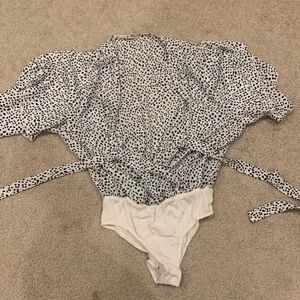 Never worn black & white altard state body suit. Size MEDIUM